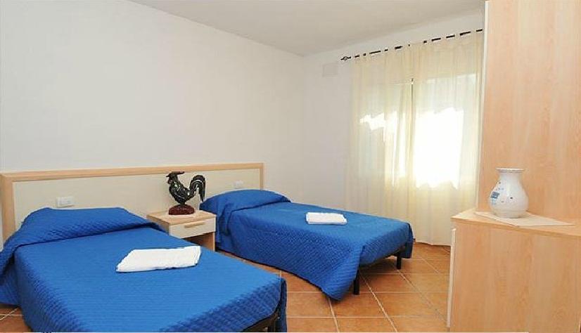Gallo Spot Hotell San Teodoro  Rum bild